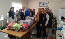 Kozaklı Halk Eğitim Merkezi'nden depremzedelere kışlık giysi