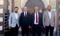 Başkan Eren'den Uçhisar Belediye Başkanı Çamcı'ya ziyaret