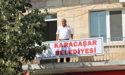 Nevşehir’in Karacaşar Beldesine Belediye Levhası Takıldı