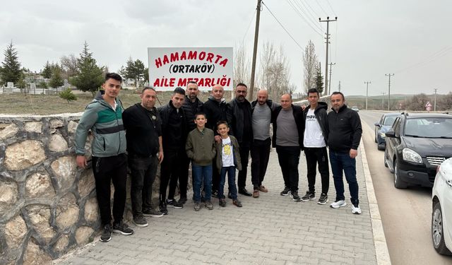Kozaklı'da gönüllü gençler mezarlığı temizledi